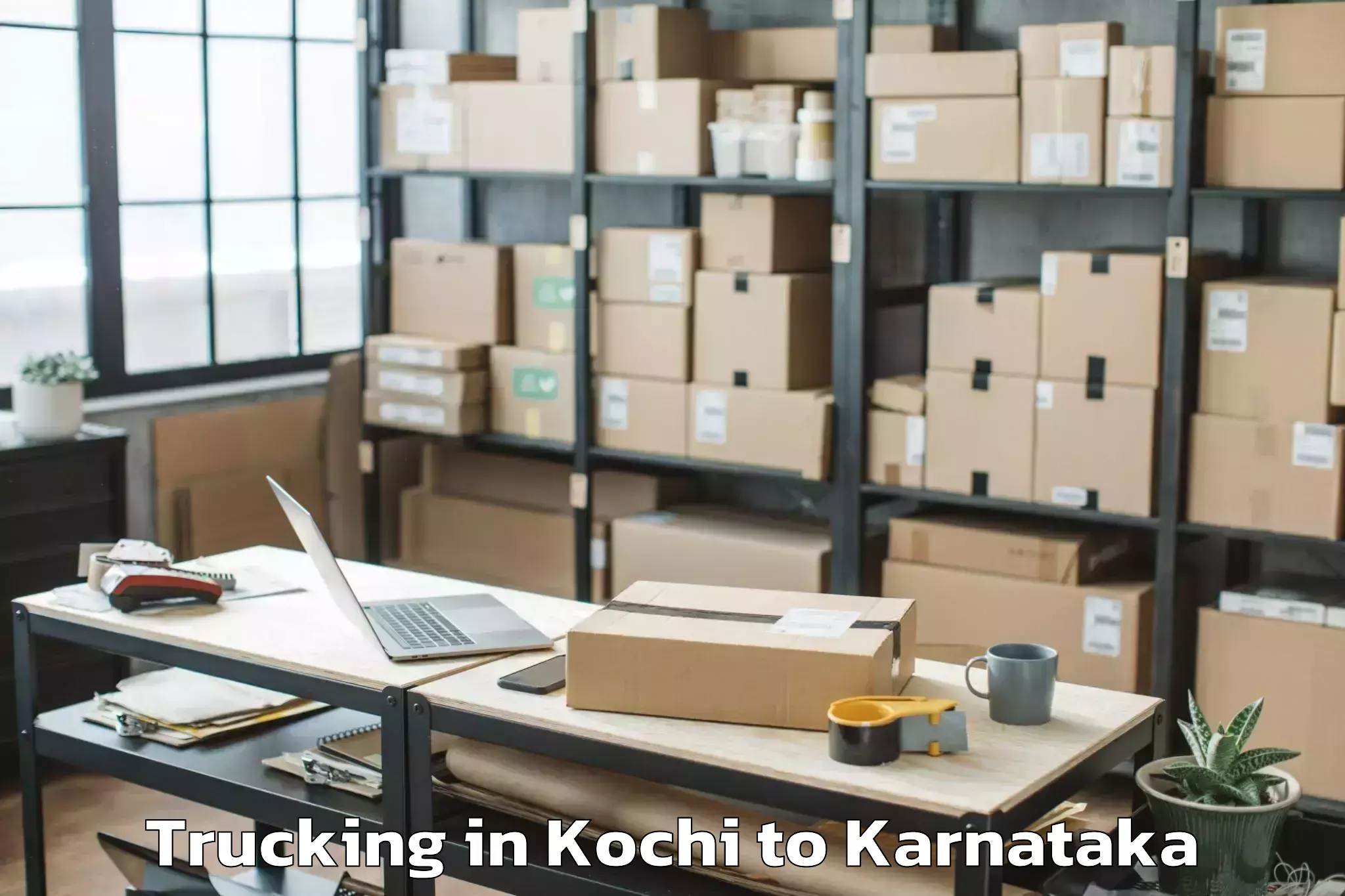 Book Kochi to Bellur Trucking Online